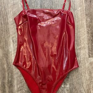 Red Leather bodysuit.